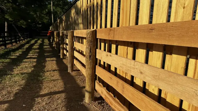 Cedar board fence line